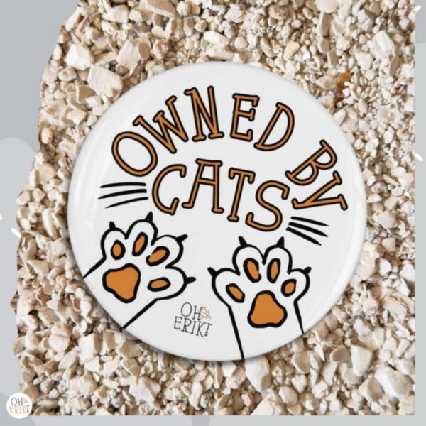 Owned by Cats cat badge in white