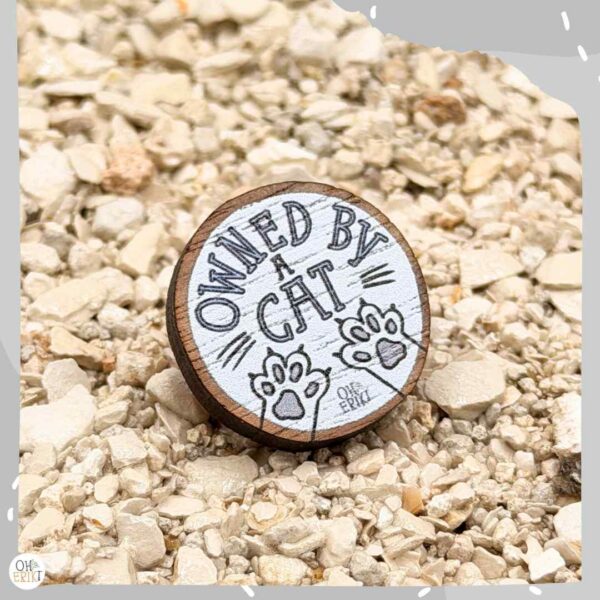 Owned by a Cat wooden cat badge in white