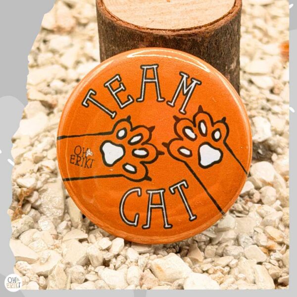 Team Cat badge in orange