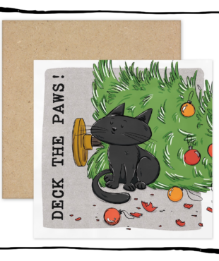 black cat sitting beside a fallen Christmas tree and broken baubles on a Deck the Paws Christmas card.
