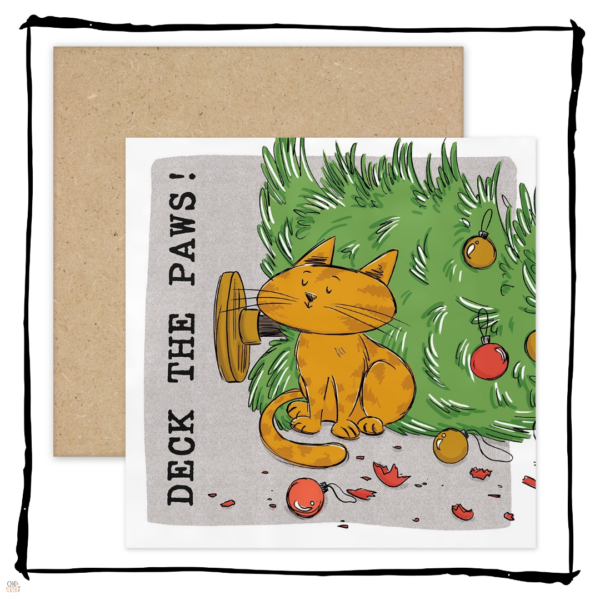ginger cat sitting beside a fallen Christmas tree and broken baubles on a Deck the Paws Christmas card.